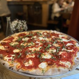 Rubirosa signature dishes The TIE DYE Pizza
Classic Pizza
Rubirosa Supreme Pizza